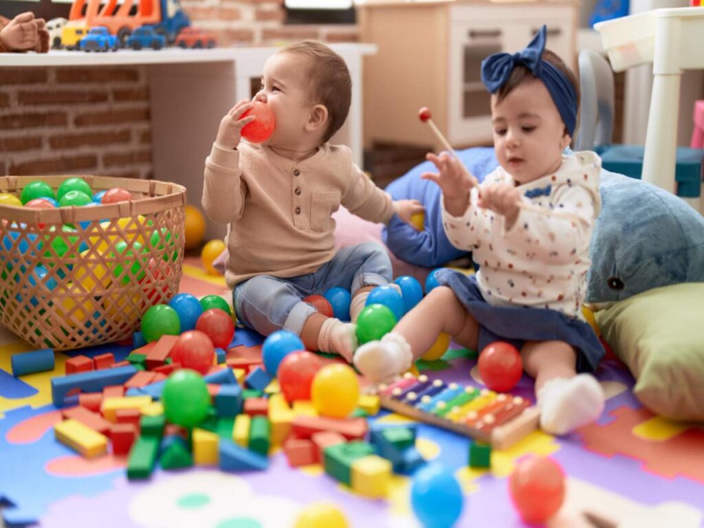 children playing different types of play in early childhood